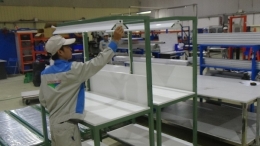 working table with steel frame with wooden surface